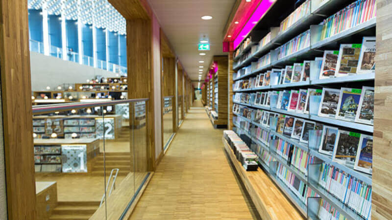 Library hallway filled with wood features finished with Rubio Monocoat's hardwax oil.
