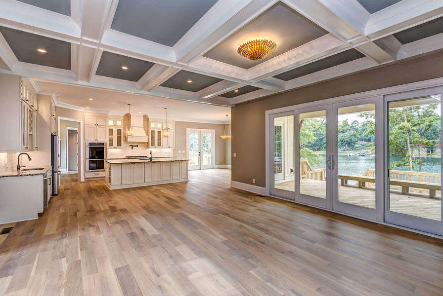 Kitchen and living room with engineered white oak floors finished with Rubio Monocoat products.