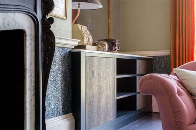 Modern vanity with wood panels.