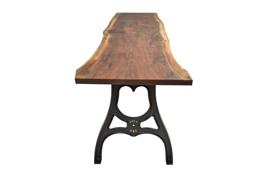 Cast aluminum legs used on walnut slab desk finished with Rubio Monocoat.