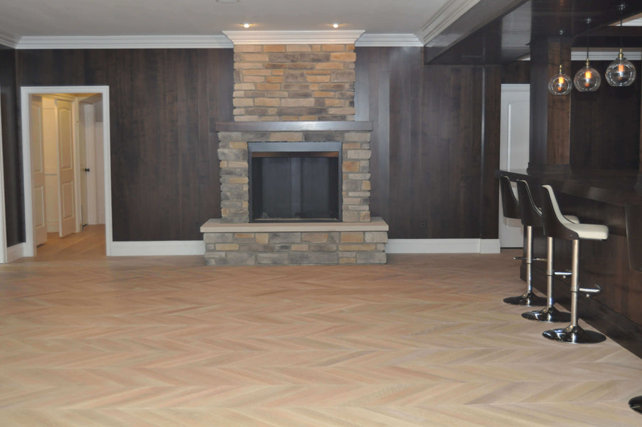 Wide view of white oak chevron floor finished with Rubio Monocoat.
