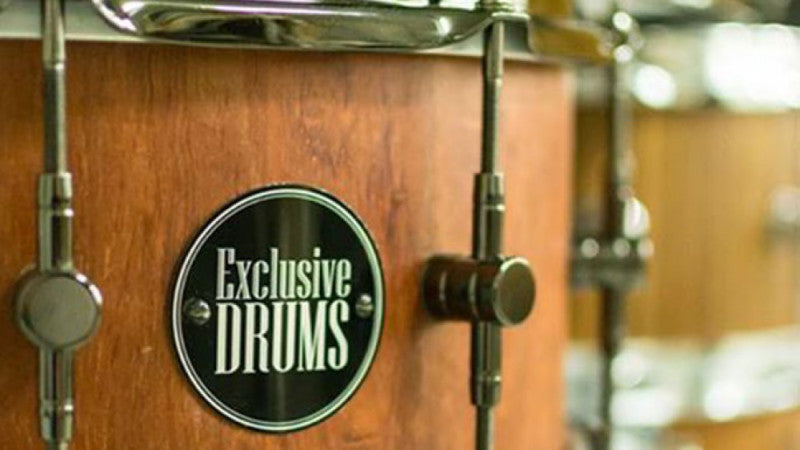 A wood drum shell with a custom matte finish.