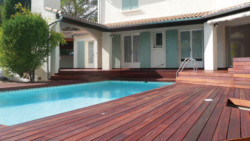 An Ipe wood pool deck finished with a plant-based hardwax oil finished, Hybrid Wood Protector.