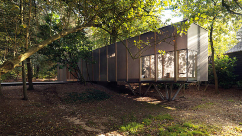 This beautiful home in the Netherlands, features swimming pool deck, floors, exterior, facade, ceiling, and walls all finished with Rubio Monocoat products!