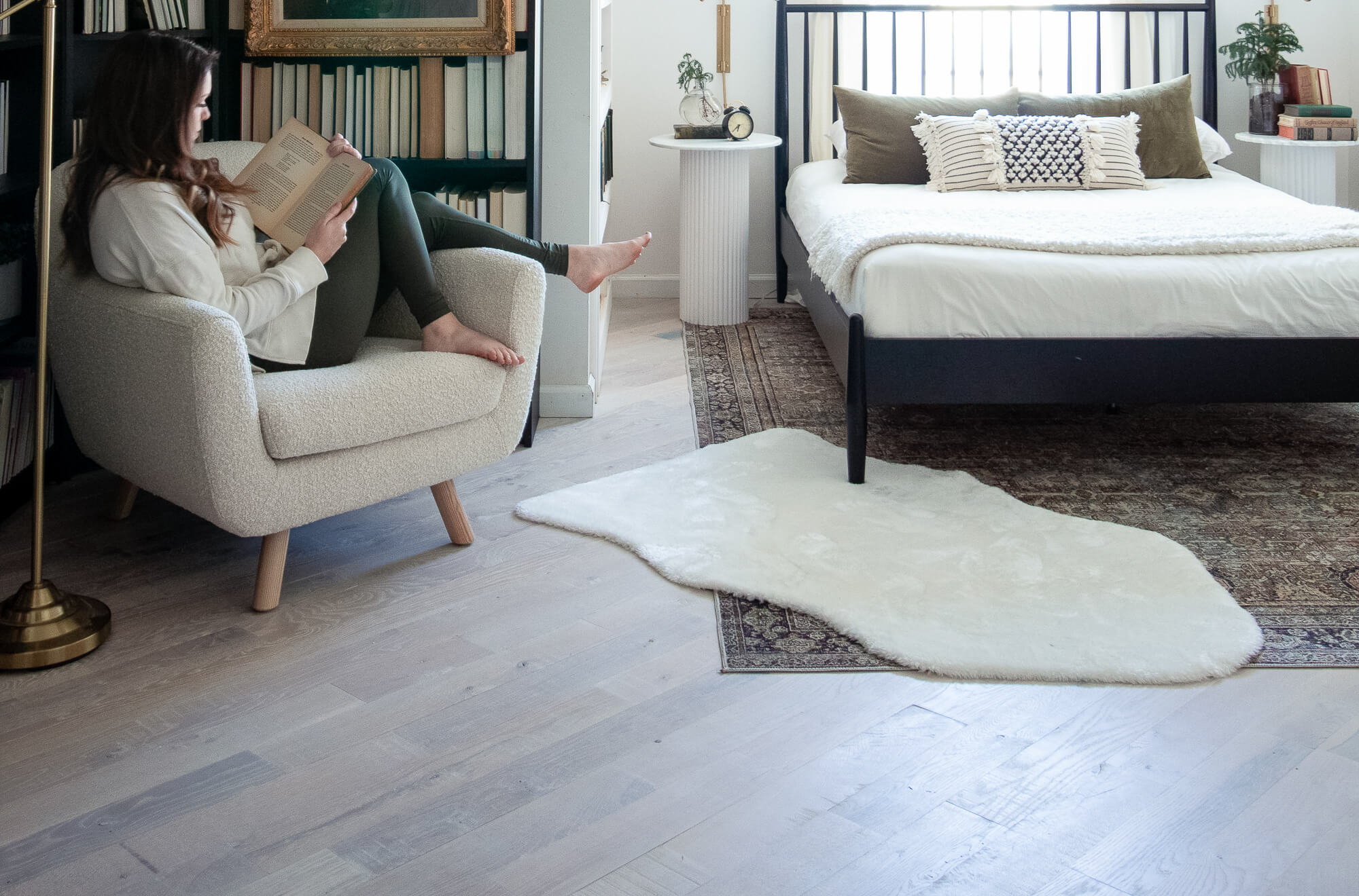 A renovated bedroom with light white oak floors finished with Rubio Monocoat.
