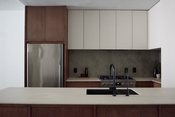 An organic modern kitchen with wood cabinets colored and protected with a hardwax oil wood finish.