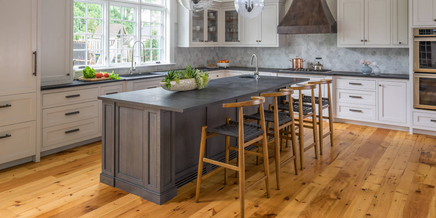 Hardwood flooring and kitchen island finished with Rubio Monocoat wood finish