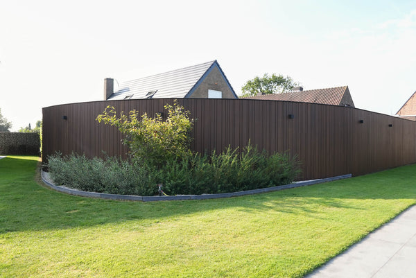 Modern fence inspiration made with thermo ayous wood and finished with Rubio Monocoat DuroGrit, and exterior wood stain and finish in one for any outdoor wood project.