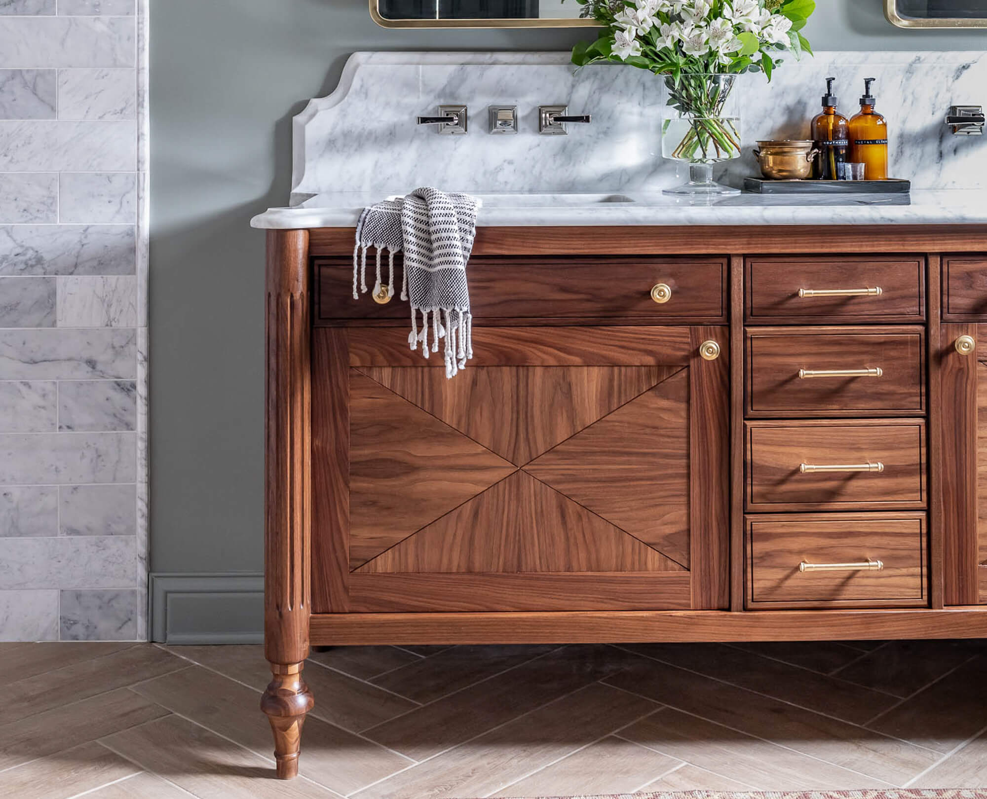 A beautiful black walnut bathroom vanity inspired by Louis XVI furniture built and designed by Jen Woodhouse.