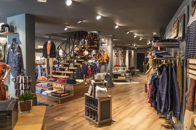 Mens clothing store with hardwax oil finished wood flooring.
