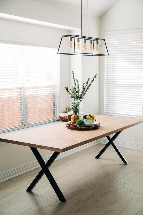 A dining table that seats eight made from white oak and finished with Rubio Monocoat Oil Plus 2C "White 5".