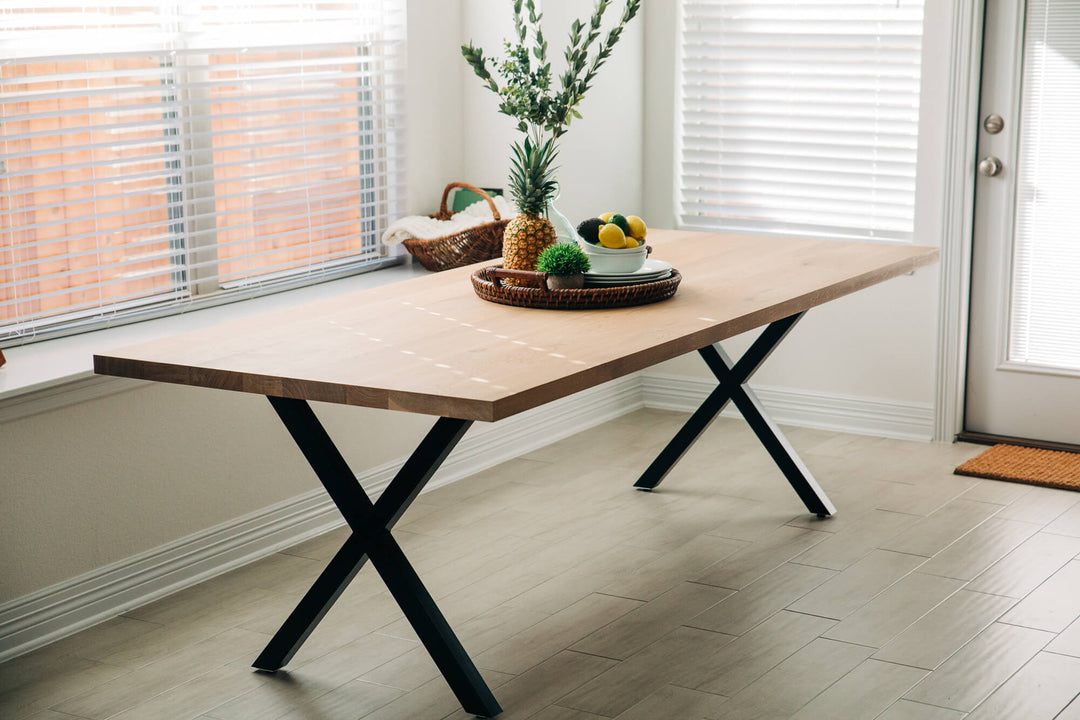 A contemporary white oak dining table finished using Rubio Monocoat Oil Plus 2C hardwax oil wood stain and finish for interior wood projects.