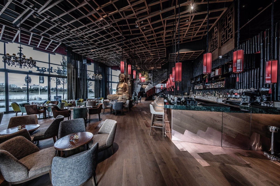 Restaurant dining room with hardwood flooring.