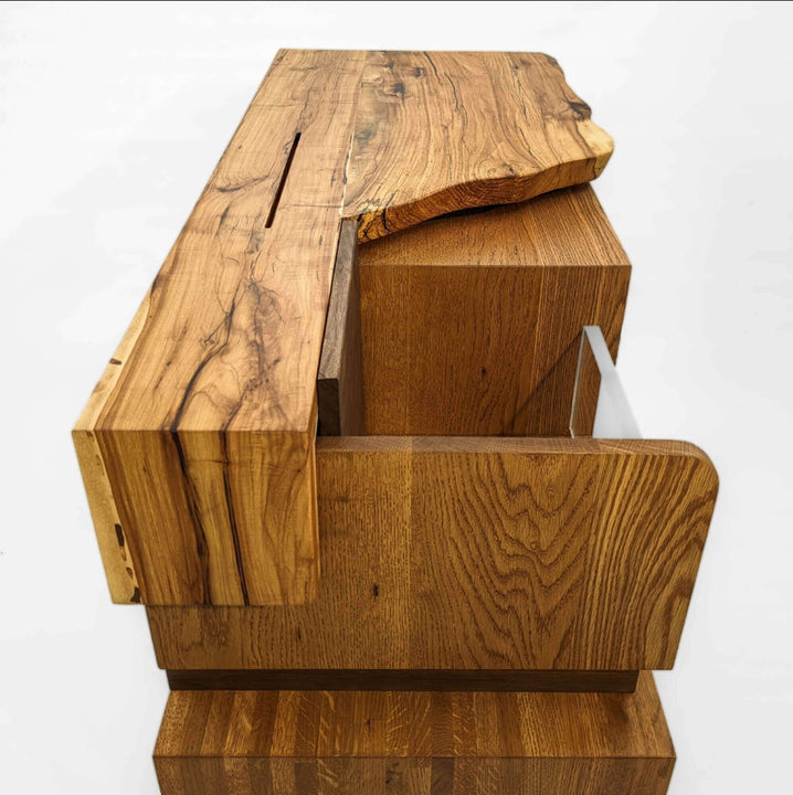 Side view of a live edge record storage console finished with a hardwax oil based finish.