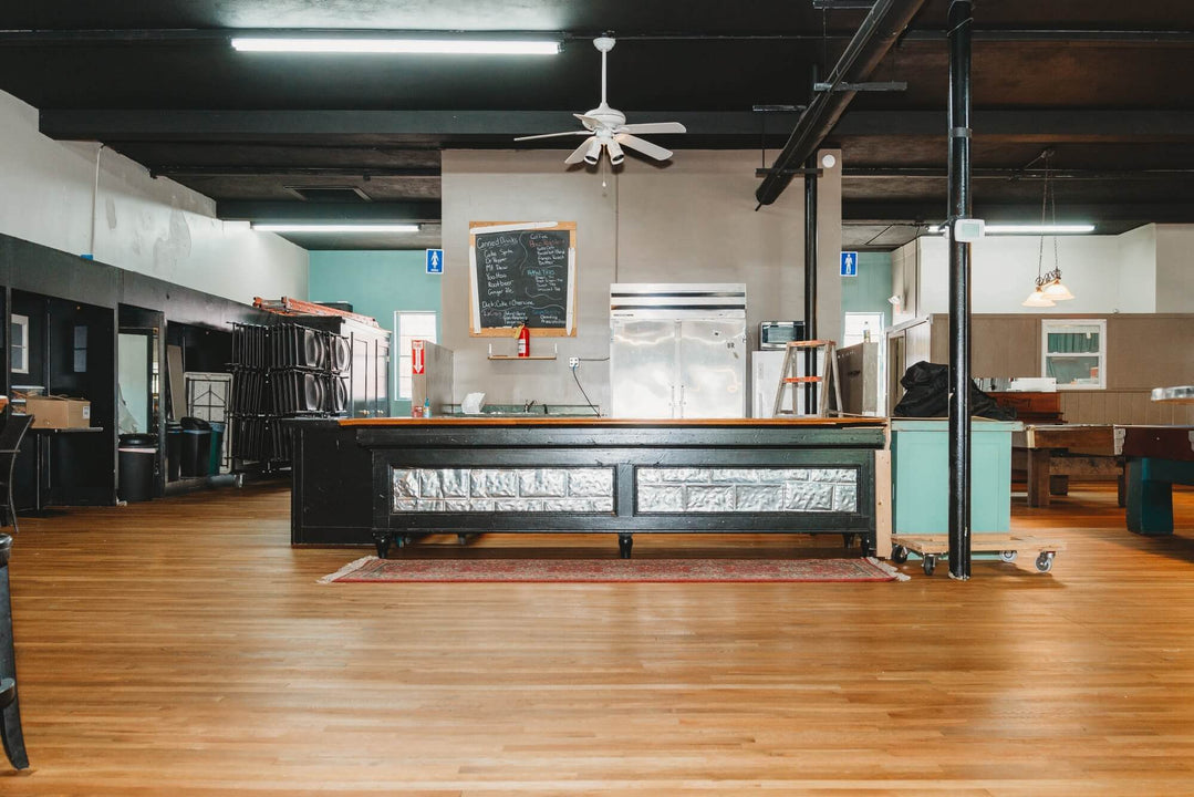 Recently refinished floors in a coffee house.