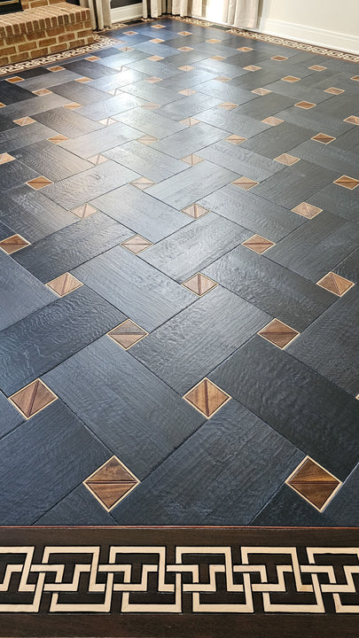 Blue-hued basketweave pattern surrounded by a Greek-inspired boarder made from wenge and maple wood.