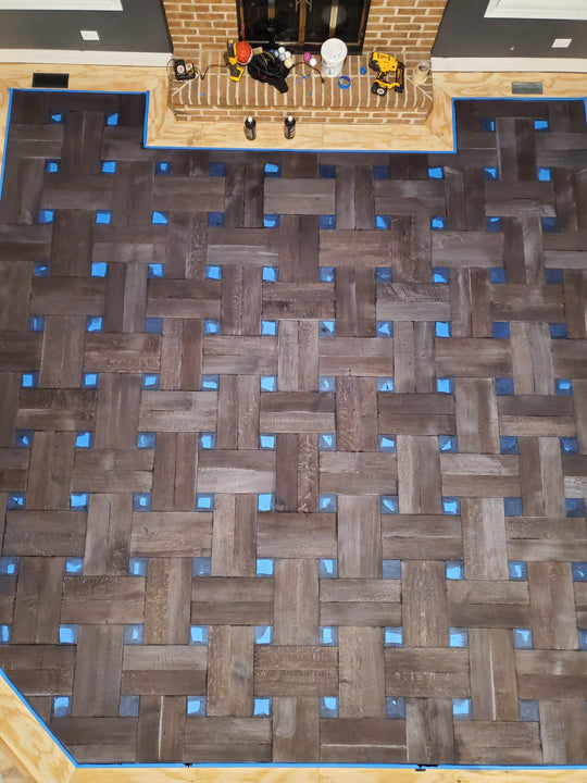 Basketweave hardwood floor treated with Rubio Monocoat Fumed Intense.