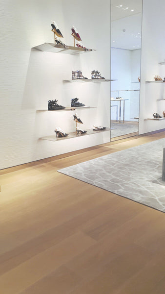 A boutique with light and creamy hardwood flooring.