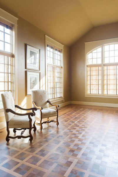 Beautiful lighting accentuates a stunning parquet floor finished with a hardwax oil finish.