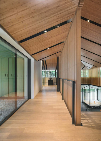 Interior with wood floors, walls, and ceiling.