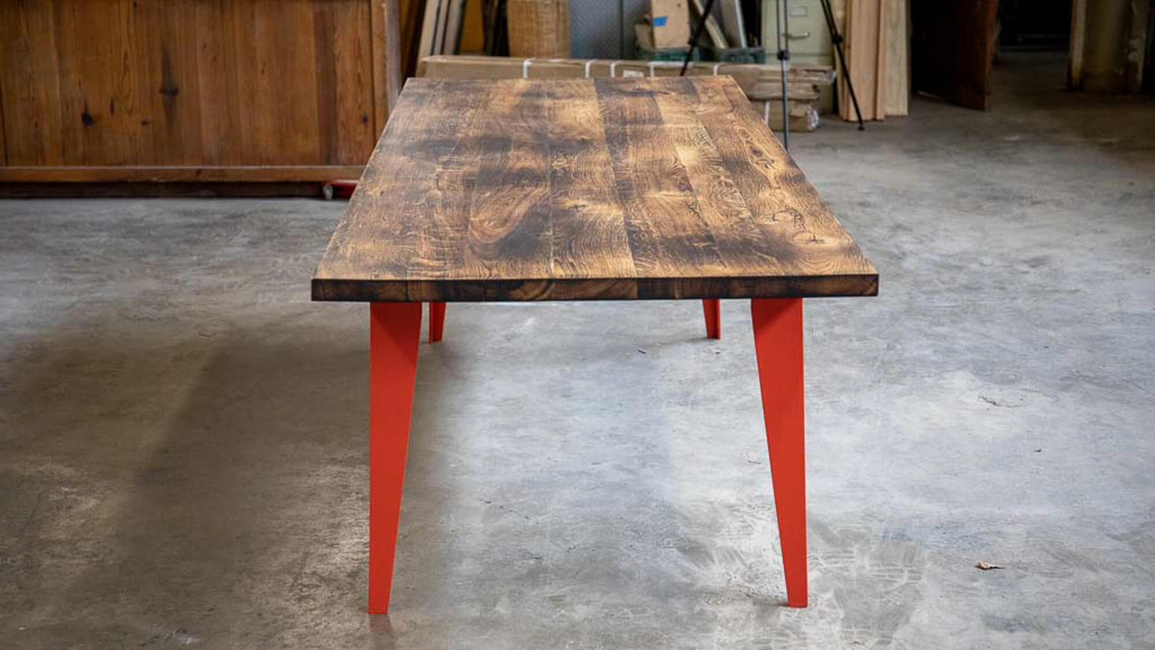 Close up of the charred grain on a white oak table.