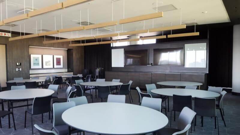 Cafeteria with wood panel designs.