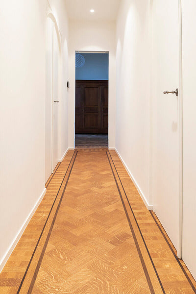 Oil Plus 2C finished herringbone hallway.