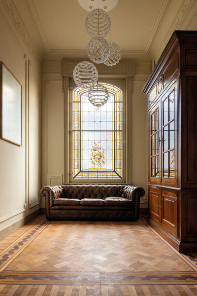 Herringbone hardwood floor with border and inlay finished using Oil Plus 2C.