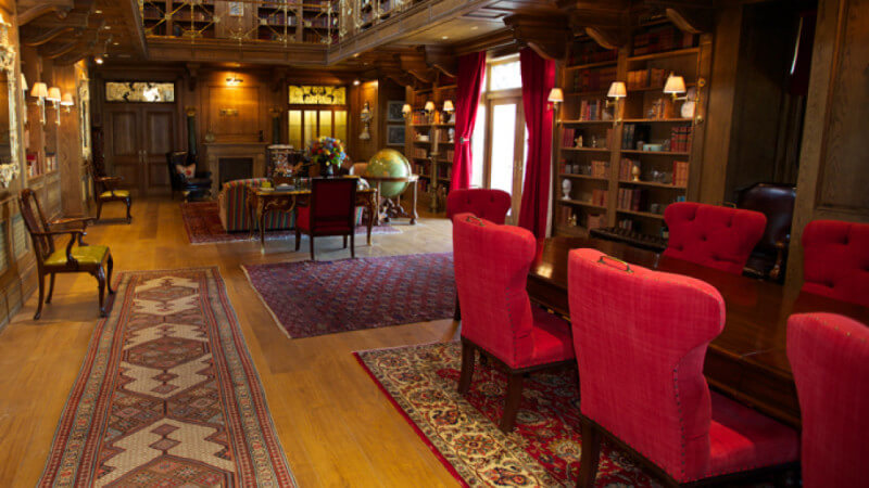 Entryway to a library featuring wood floors finished with Rubio Monocoat.