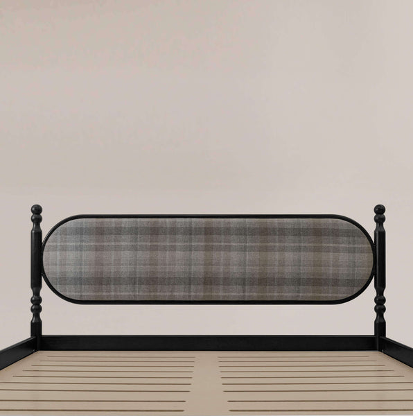 Plaid wood upholstered headboard in an oval shape complete with two bedposts inspired by an ancient sculpture.