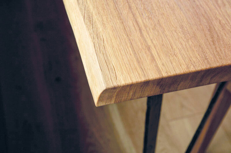 Details of oak wooden table finished with Rubio Monocoat hardwax oil called Oil Plus 2C.