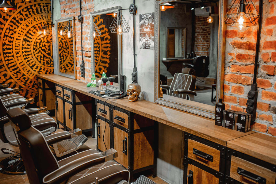 Warm and cozy industrial barbershop interior design.