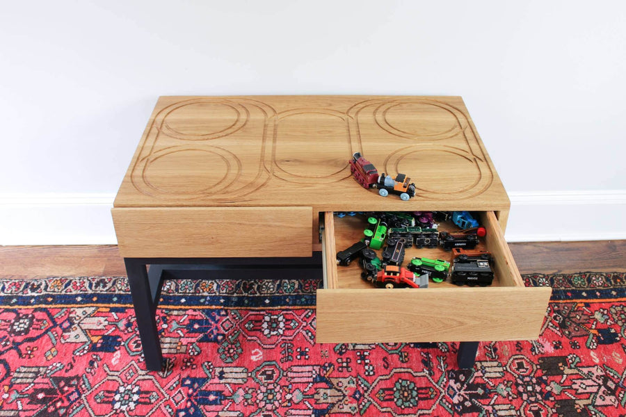 DIY train table finished with a toy safe wood finish.