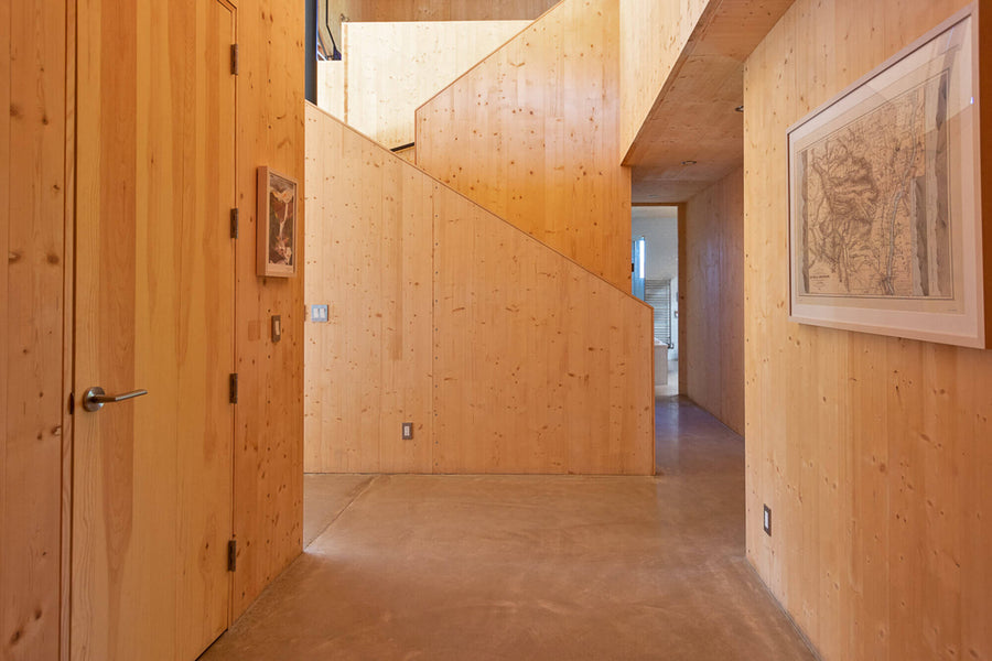 Untreated cedar wall paneling in a modern lodge-style home.