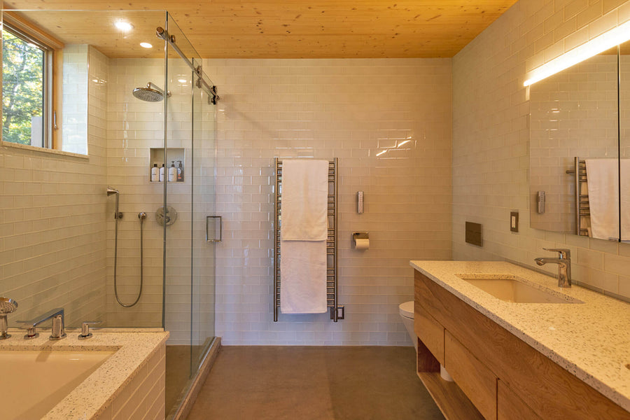 Modern bathroom with both tile and wood accents on the walls. The wood was treated with Rubio Monocoat Oil Plus 2C.