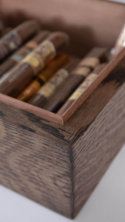 Handcrafted white oak humidor finished with a custom blend of Rubio Monocoat Oil Plus 2C in Charcoal and Black.