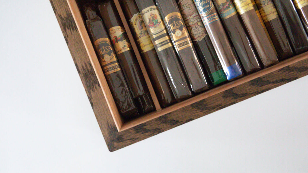 Cigars stored in a handmade cigar humidor created for a retirement gift.