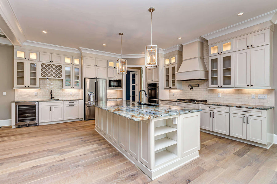 Kitchen features engineered white oak floors finished with Rubio Monocoat Oil Plus 2C.