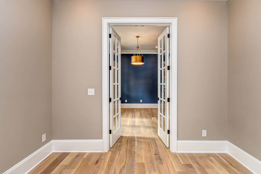 Door way in a house featuring white oak floors finished with Rubio Monocoat Oil Plus 2C.