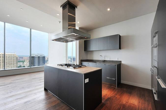 Kitchen with hardwood flooring finished with Rubio Monocoat Oil Plus 2C.