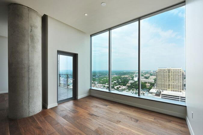 Hotel rooms with beautiful views of Austin, TX feature wood floors finished with Rubio Monocoat.