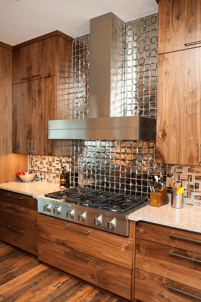 Rustic wood drawer fronts and cabinetry in a kitchen.
