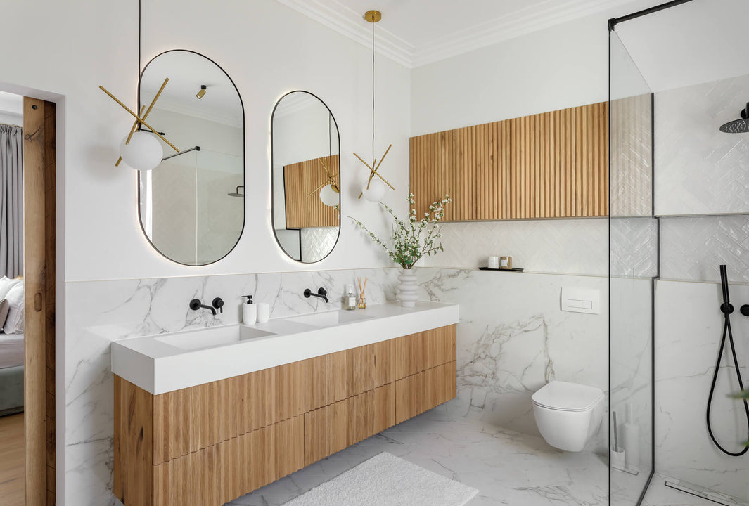 Master bathoom featuring a white oak wood slatted bathroom vanity and wall detail finished with Rubio Monocoat hardwax oil wood finish.