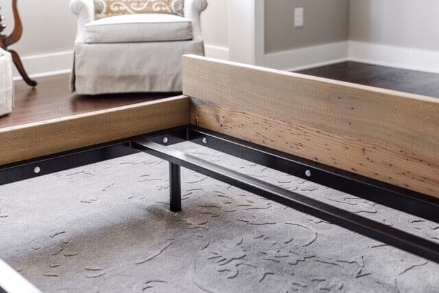 Natural wood bed-frame