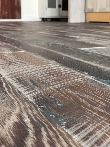 Detail shot of skip and miss oak wood flooring that was Fumed and finished with Oil Plus 2C in a custom color.