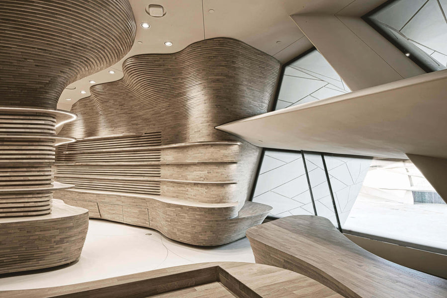 Gift shop designed using individual pieces of wood that contour to the curved flow of the room.