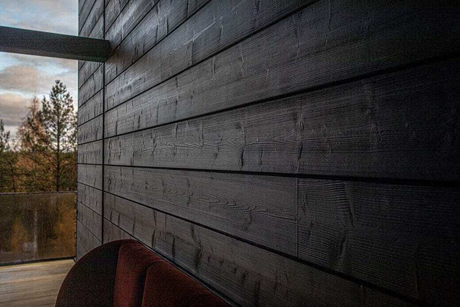 Dark wooden accent wall interior
