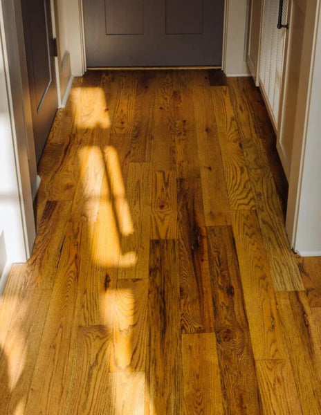 Sun dances across red oak floors finished with Rubio Monocoat.