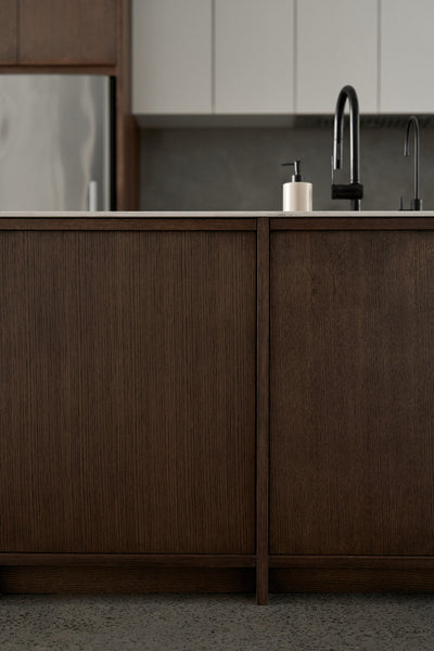 Rich brown white oak kitchen cabinets finished with Rubio Monocoat hardwax oil wood finish.