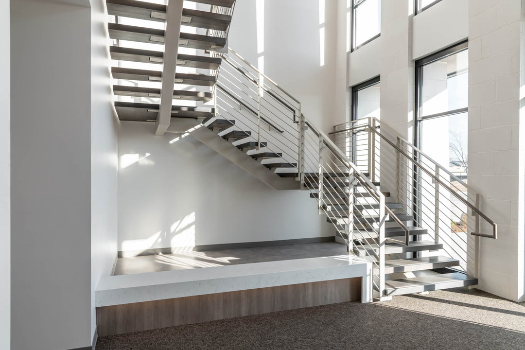 Custom staircase in a leased office building finished with Rubio Monocoat Precolor Easy and Oil Plus 2C hardwax oil wood finish.
